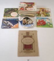 A quantity of cigarette and trade cards, some in albums