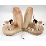 A pair of marble bookends with Beswick fox hounds (one tail a/f) 15cm tall