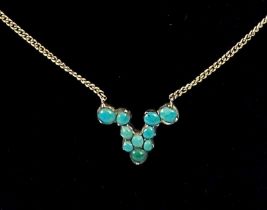 A 9 carat turquoise set pendant and chain, 4.6g, 1.8cm wide