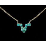 A 9 carat turquoise set pendant and chain, 4.6g, 1.8cm wide