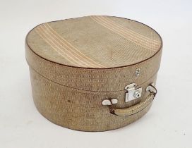 A vintage Revolution circular hat box