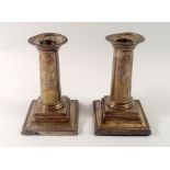 A pair of silver column candlesticks, 14cm tall, London 1895 and 1896 by Charles Boyton II
