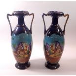 A pair of Edwardian two handled vases decorated desert scenes, one a/f, 33cm tall
