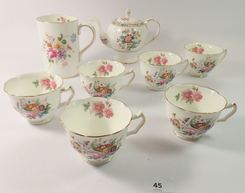 A set of six Coalport June Time tea cups, a Derby Posies tankard and a Foley Ming Rose teapot