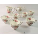 A set of six Coalport June Time tea cups, a Derby Posies tankard and a Foley Ming Rose teapot