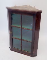 A late 19th century corner cabinet with glazed door, 80 x 56 x 34cm