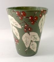 An Art Pottery flared vase painted leaves and berries, 20cm