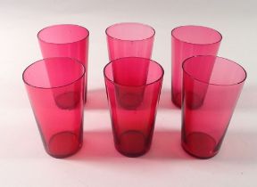 A matched set of five small cranberry glass tumblers, 9.5cm