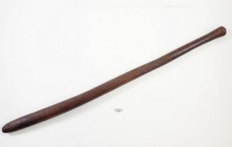 An Aboriginal stone carved hardwood club, 67cm long