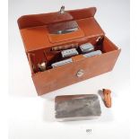 A gentleman's leather travelling toiletry set