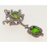 A Georgian white metal pendant set green and white paste, 4.6cm drop, 3cm wide