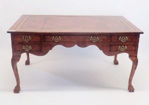 An early 20th century burr walnut large Queen Anne style library desk with five drawers (five