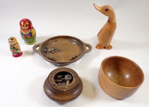 A small group of wooden items, oak bowl, duck etc.