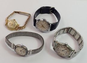 A group of four vintage mechanical watches including Avia, Oris etc.