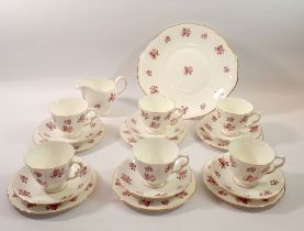 A Queen Anne floral printed vintage tea service No. 8670 comprising six cups and saucers, six tea