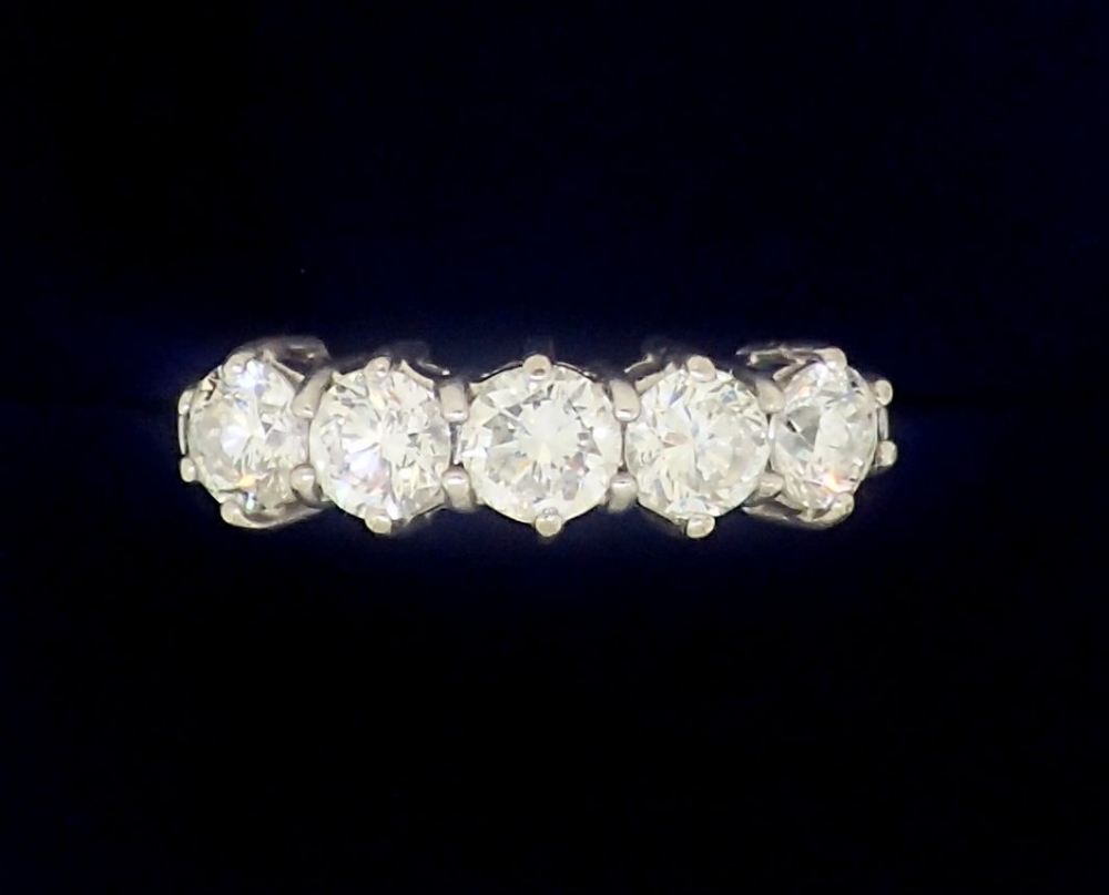 An 18 carat white gold five stone diamond ring approx 1.3 cts (colour H/I , clarity VS), Size L