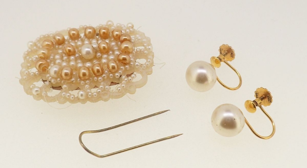 An antique pearl and yellow metal brooch or pendant and a pair of 9 carat gold pearl earrings