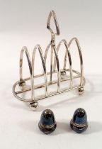 A silver plated toast rack and a silver pair of acorn form cruets, 12.5g