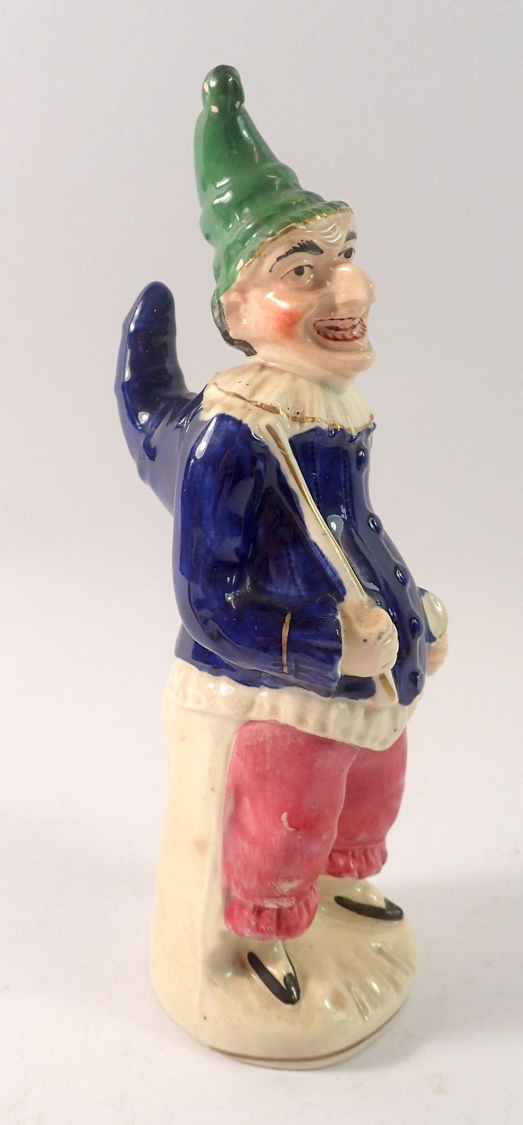 A Victorian Staffordshire figure of Punch, 21cm