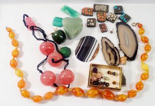 A box of stone beads and samples etc.