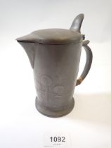 A Tudric pewter Arts & Crafts hot water jug by Archibald Knox for Liberty, No 0967