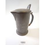 A Tudric pewter Arts & Crafts hot water jug by Archibald Knox for Liberty, No 0967