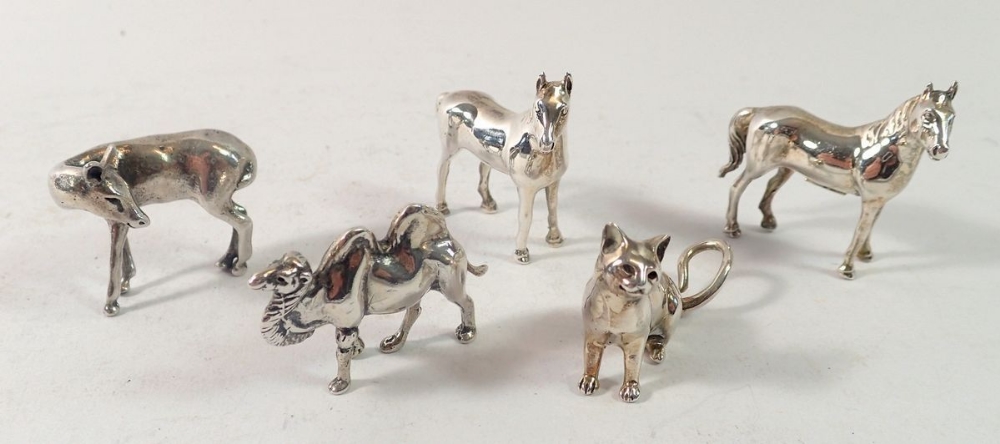 A collection of five miniature silver animals including horses, cat, camel and deer, 73.5g total