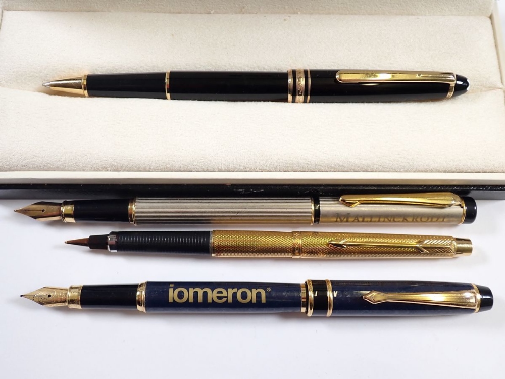 A Mont Blanc ballpoint pen, boxed and three various fountain pens including a gold plated Parker - Image 2 of 2