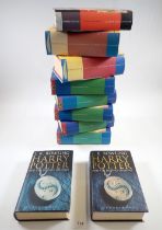 Ten various Harry Potter books - first editions