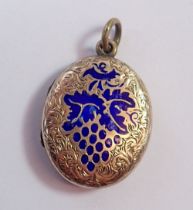 A Victorian gold oval locket with blue enamel vine inlay, unmarked but tested as 9ct gold 5.6g, 2.