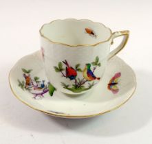 A Herend cup and saucer painted birds