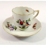 A Herend cup and saucer painted birds