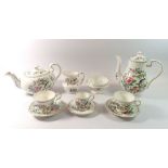 An Aynsley 'Pembroke' tea and coffee service comprising cake plate, six teacups (two cracked) and