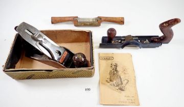 A Stanley No 4 wood plane, boxed with instructions and a Stanley 735 soft board plane plus a spoke