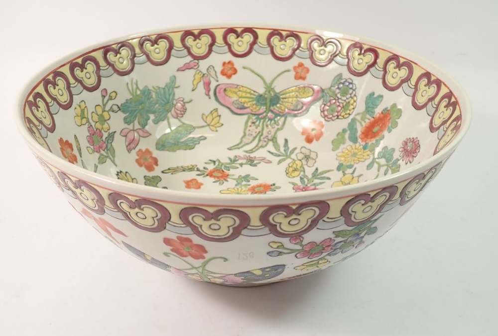 A 20th century Chinese Canton bowl painted butterflies and flowers, 26cm diameter