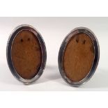 A pair of oval silver photograph frames, 155 x 11cm, Birmingham 1922