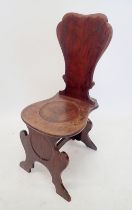 A Georgian mahogany shield back hall chair