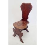 A Georgian mahogany shield back hall chair