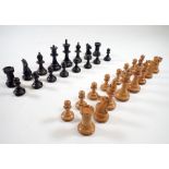 A boxwood and ebony weighted chess set, King 6.5cm tall