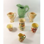 A Shorter & Sons green Daisy jug, two Wade jugs and four various Art Deco vases