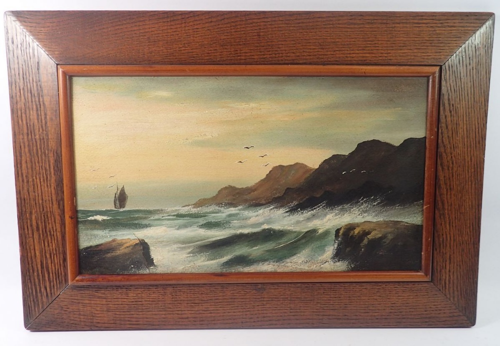 A 19th century oil on board Cornish coastal scene, 22 x 39cm