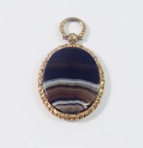 A Victorian gold plated engraved oval pendant set agate, 3.7 x 3.1cm