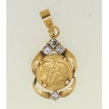 A 14 carat gold pendant set white stone, 1.4g