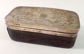 A silver mounted leather toiletry box with engraved scrollwork decoration, Sheffield 1905, 16 x