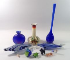 A group of coloured glass including fish and miniature animals
