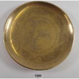 A Chinese brass engraved dish, 23cm diameter