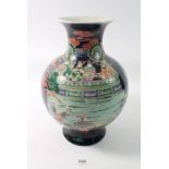 A Chinese famille noir bulbous vase painted warriors attending a Royal Palace, 26cm