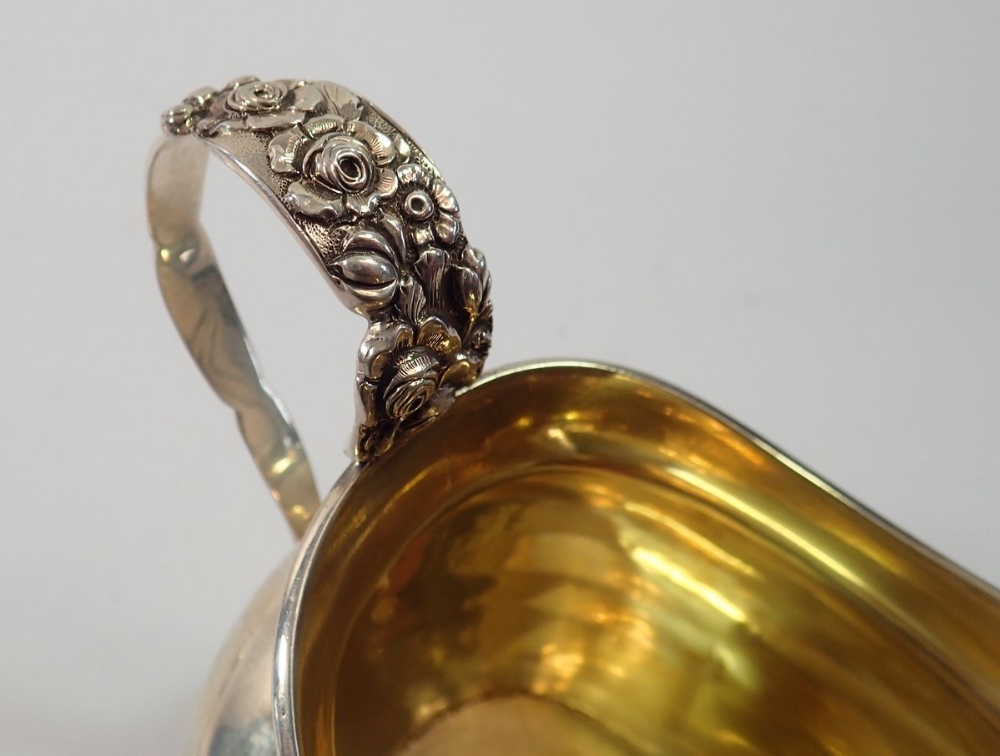 A Victorian silver milk jug with cast floral handle, London 1851, by Samuel Hayne & Dudley Cater, - Image 4 of 4