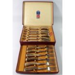 A set of horn handled and silver plated cutlery by Neadham, Veall and Tyzack Ltd, boxed