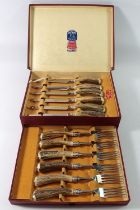 A set of horn handled and silver plated cutlery by Neadham, Veall and Tyzack Ltd, boxed